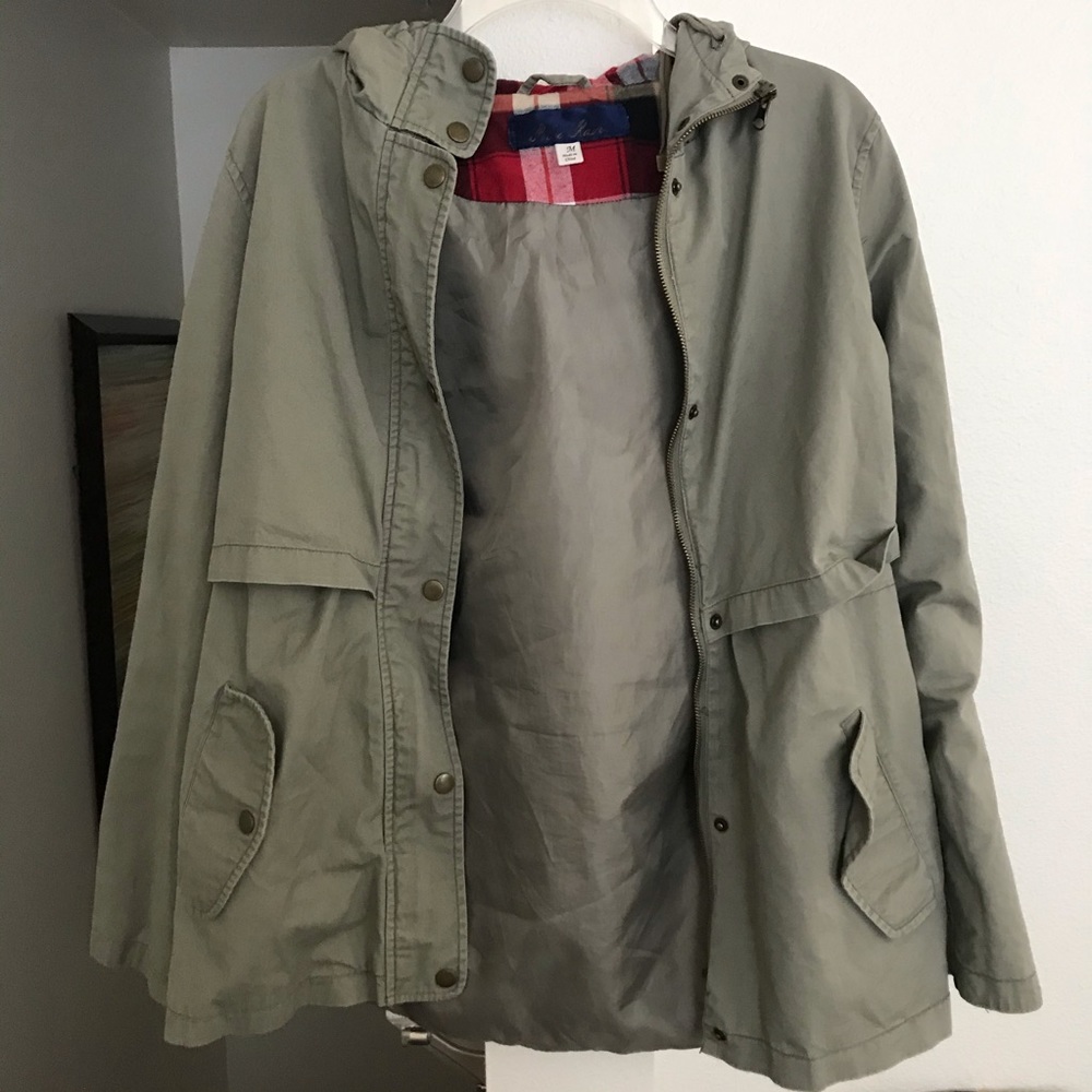 Green cargo-style jacket with plaid detail inside!